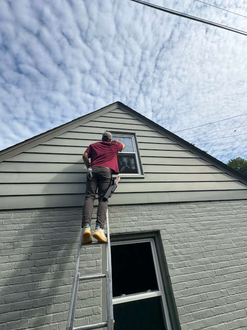 Window washing on a multi-story home